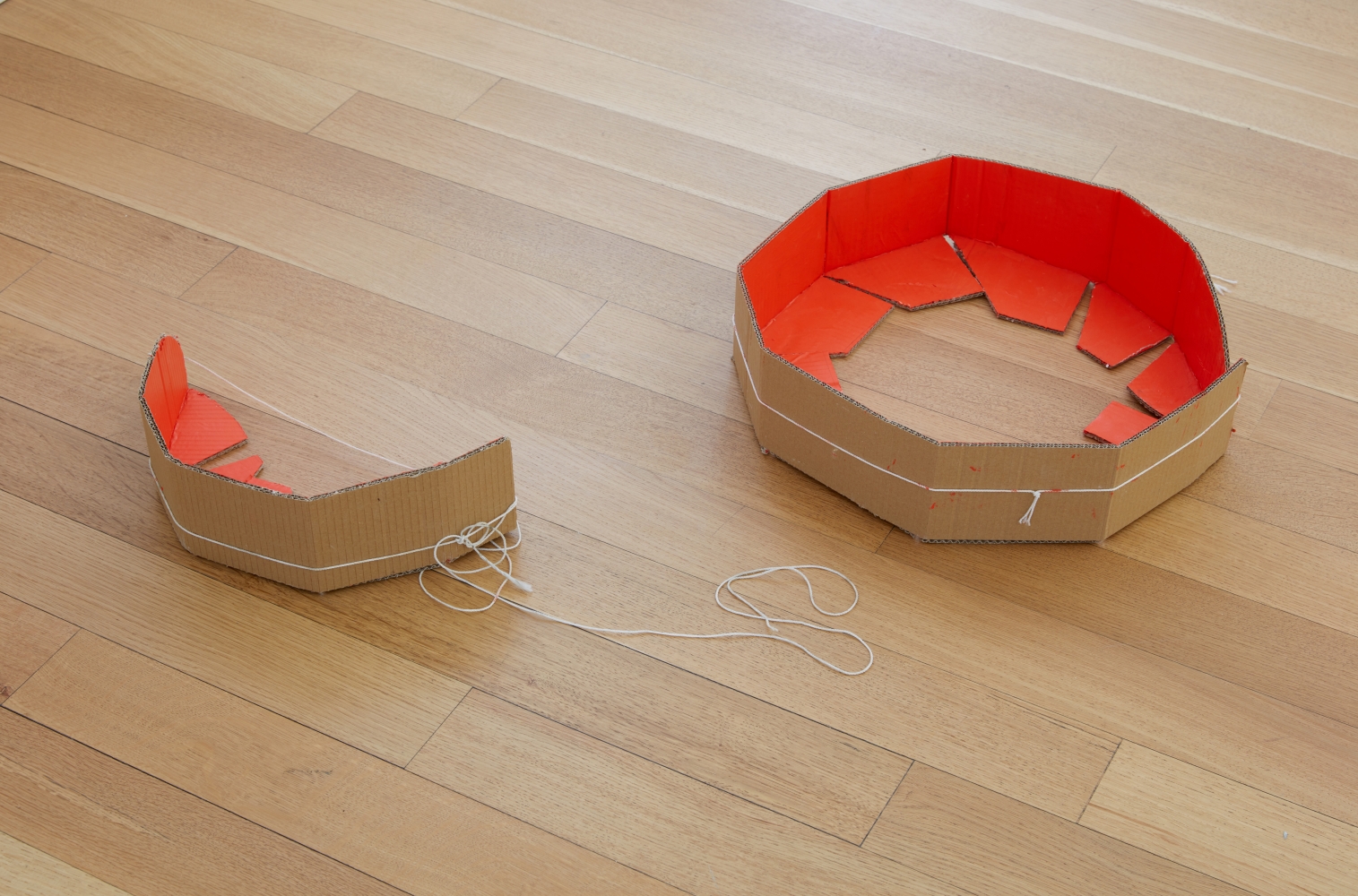 Esther Kläs SEE YOU, 2021 cardboard, paint, and string 4 1/2 x 36 x 31 inches (11 x 91 x 79 cm), overall