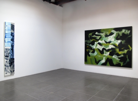 Installation of the art exhibition "Heat Waves" with 2 paintings on white walls