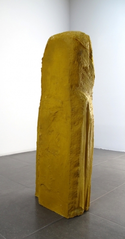 yellow sculpture in gallery made of aqua-resin and pigment by artist Esther Kläs