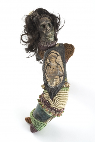 Joyce J. Scott Mammie Wada V, 1981 – 1978 mixed media, beads, thread, raffia, yarn, hair, leather, photograph and ink 14 x 18 x 10 inches (35.6 x 45.7 x 25.4 cm) (JJS78-02)